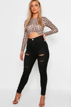 Plus Schwarze Jeggings Mit Riss